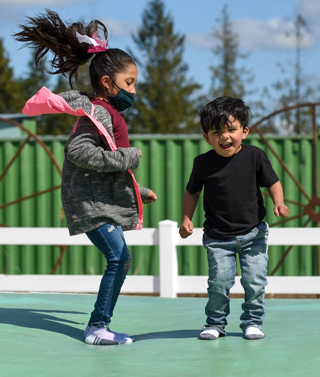 Children On Jumping Pillow