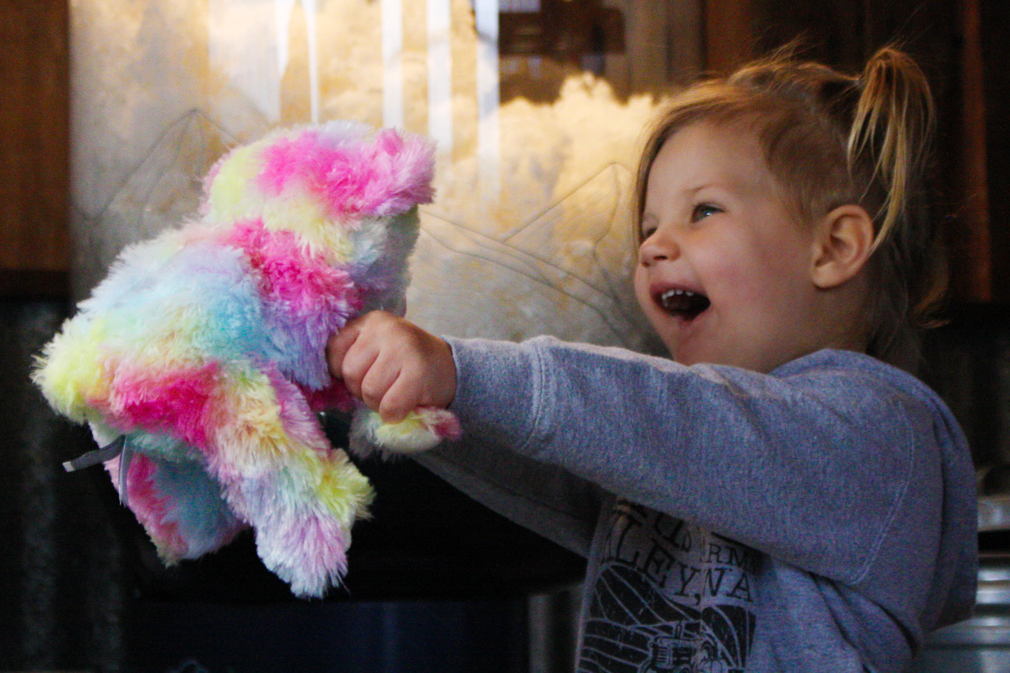 Child smiling with Build-a-Buddy stuffed animal at Maris Farms SummerFest 2026